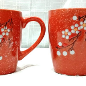 Tazón 500 cl reforzado con mango con motivo floral en colores anaranjados verdes celeste negros